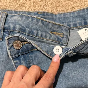 Distressed Denim Mini Skirt thumbnail 4