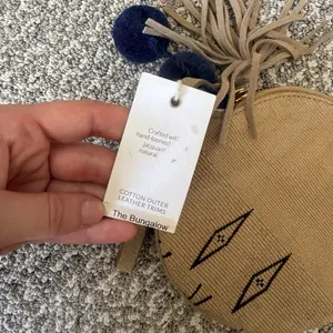 Bloom & Give Tan Round Mini Wristlet with Tassel & Pom Pom’s thumbnail 5