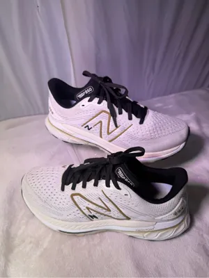 New Balance Women's White and Gold Athletic Running Shoe thumbnail 3