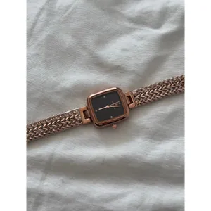 Rose gold watch with black accents thumbnail 7