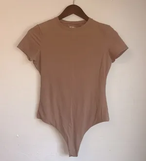 Pumiey Short Sleeve Bodysuit - Women's Size Medium - Crew Neck - Tan Nude thumbnail 1