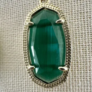 Kendra Scott Dani earrings in gold and emerald cat's eye thumbnail 5