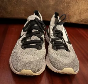 Black, white, grey epic react Nike shoes thumbnail 1