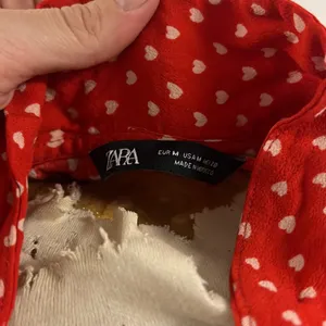 Zara MD red short sleeve red white heart oil stained button up thumbnail 3