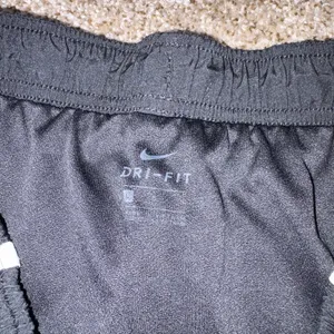 Nike Dri-FIT Women's Black/White Trim Running Shorts Drawstring Size Large thumbnail 2