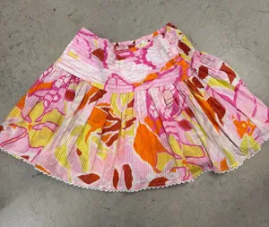 Poupette St. Barth Pink Floral Pleated Mini Skirt with Orange and Yellow Accents thumbnail 1