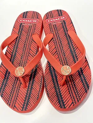 Coach Alessa Flip-Flop Sandals featuring a coral and thumbnail 1