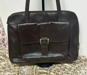 Buxton brown leather briefcase zip & snap pockets over shoulder vintage thumbnail 1