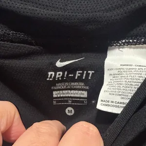Nike Dri‎ Fit Black Performance Leggings with Small Swoosh Woman’s Size Medium thumbnail 2