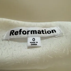 REFORMATION | White Jacquard Satin Allira Asymmetrical Off Shoulder Blouse | 0 thumbnail 8