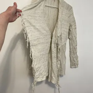 FREE PEOPLE FP Take a Bow Cardigan Oatmeal Cream Fringe Bow Detail Boho Sweater thumbnail 7