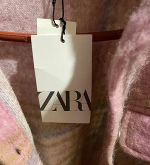 ZARA pink plaid wool-blend shacket with soft brushed texture. Lightweight outer layer styled with front flap pockets and a relaxed collar. Versatile layering piece that adds a feminine pop of pink to outfits. thumbnail 3