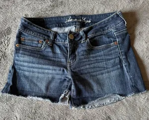 American Eagle Booty Shorts Jean‎ Cut Off Frayed Medium Wash Size 4 Stretch thumbnail 1