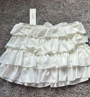 Urban Outfitters White Tiered Ruffle Mini Skirt thumbnail 1