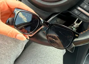 Classic Black Women's Sunglasses - Timeless Cat-Eye Style thumbnail 1