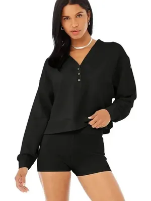 Alo Yoga Micro Waffle Pleasant Cropped Henley in Black thumbnail 1