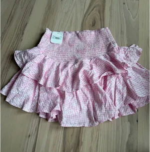 Altar'd State Pink Tiered Ruffle Smocked Mini Skirt thumbnail 3