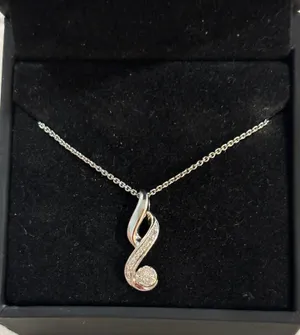 Zales 1/15 CT. T.W. Composite Diamond Flame Pendant Necklace In Sterling Silver thumbnail 1