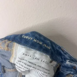 American Eagle Outfitters Distressed High-Rise Blue Jeans thumbnail 7