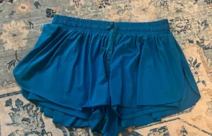 Blue flowy athletic shorts Size M thumbnail 1