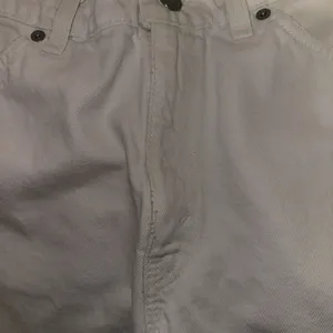 Vintage Levis 912 Slim Fit Tapered Leg Jeans White Orange Tab 11 Short Raw Waist thumbnail 12