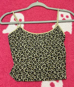 NIKIBIKI Stylish leopard print top with spaghetti straps. Perfect for a bold look. thumbnail 1