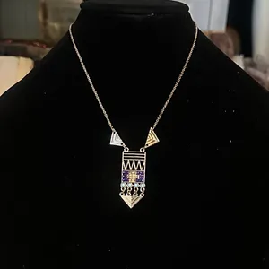 Gold tone abstract pendant necklace thumbnail 2