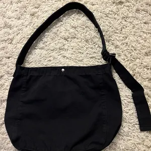 Minimalist Black Shoulder Bag with Crescent Shape thumbnail 1