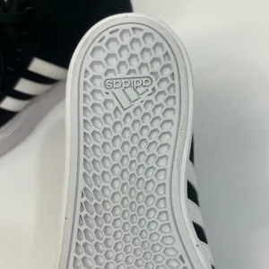 Adidas Women’s 6.5 Eco-Friendly Black and white sneakers thumbnail 10