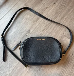 Michael Kors Black Pebbled Leather Rounded Crossbody with Gold Hardware thumbnail 1
