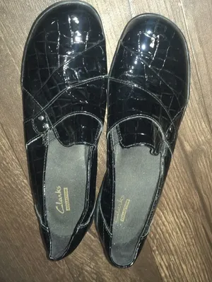 Clarks shiny crocodile pattern heeled black slip on shoes thumbnail 1