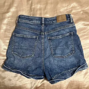 American Eagle ੈ✩‧₊˚  blue denim high waisted shorts thumbnail 5