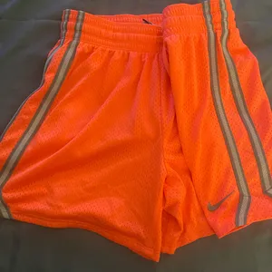 Nike Vibrant Orange Mesh Shorts with Silver Stripes thumbnail 1