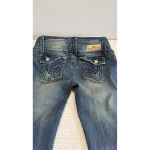 Almost Famous Womens Low Rise Bootcut Jeans Distressed Embroidered Wings Size 5 thumbnail 4