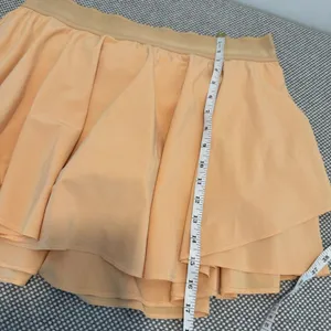 Lululemon Court Rival High-Rise Skirt *LongSummer Glow Size 12 thumbnail 10