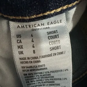 Like new!! American Eagle Outfitters Distressed Indigo Skinny Jeans thumbnail 7