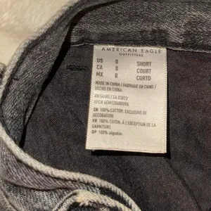 American Eagle Outfitters black & gray distressed jeans. Size 0 short thumbnail 4