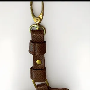 Adrienne Vittadini Brown luggage tag ID holder brown leather gold tone Logo thumbnail 6