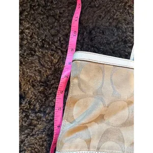Signature coach bag with accent thumbnail 13