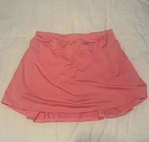 Pink tennis skirt with built-in shorts #tennisskirt thumbnail 1