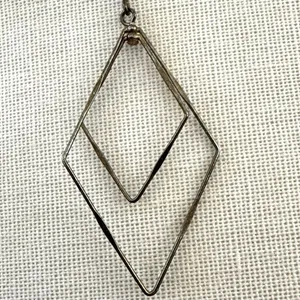 Silver tone geometric drop earrings thumbnail 3