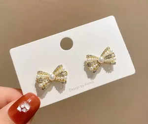 Gold Plated Bow Earrings thumbnail 1