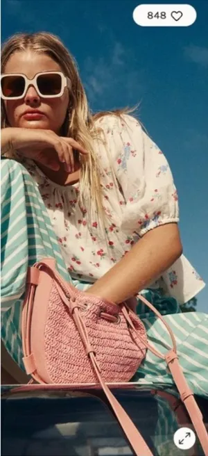 Free People Cabana Woven Drawstring Crossbody Bag in Vintage Pink thumbnail 1