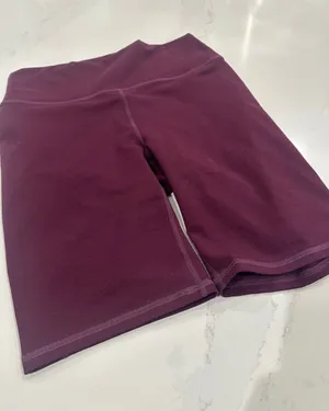 Fabletics Purple Wine Colored PowerHold‎ Biker Shorts size medium thumbnail 1
