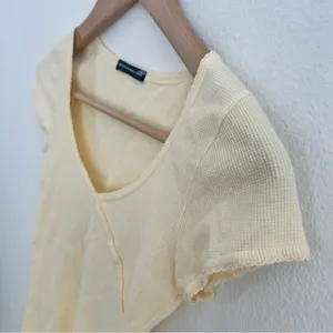 yellow Brandy Melville tee with a cute criss-cross detail thumbnail 3