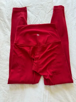 Lululemon red align leggings. Size 2; 25” long. Good condition with little peeling. Hung dry every wash thumbnail 4