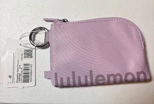 Lululemon Clippable Card Pouch Color: Lilac Play: LLAY/LOTU/SLVR thumbnail 1