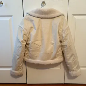 Hollister Faux Shearling Cropped Biker Jacket in Beige thumbnail 3