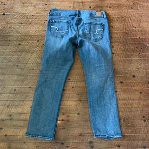 American Eagle Artist low rise medium wash distressed jeans thumbnail 3