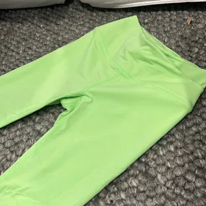 Free People Neon‎ Green Criss Cross Waist Leggings thumbnail 1